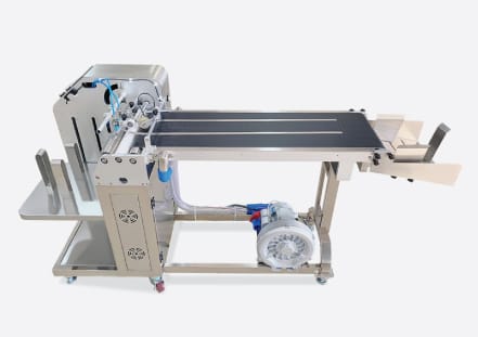 Packaging system Industrial packaging automation system with conveyor belt and blower